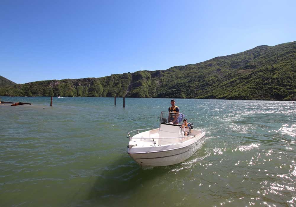 speedboat to komani lake