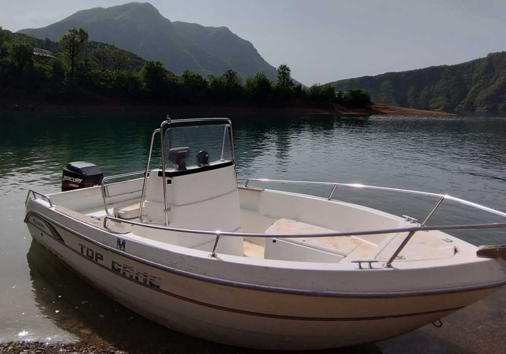 speedboat to komani lake